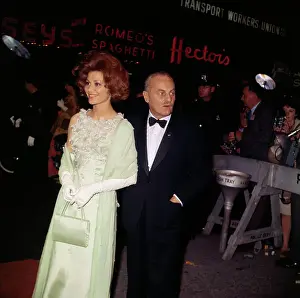 Darryl Francis Zanuck Prints: Irina Demich and Darryl F. Zanuck Outside Theater