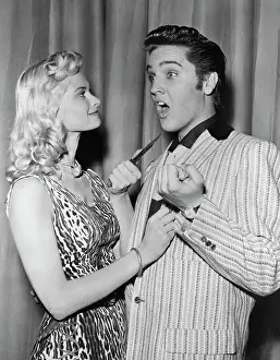 Intimidation Prints: Irish McCalla Playfully Threatening Elvis Presley