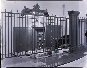 Iron Prints: Iron-Grilled Mortgage Window