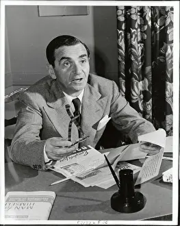 Irving Berlin Sitting at his Desk
