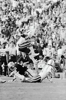 Rivalry Prints: Irving Fryar Hurdles Jeff Barnes
