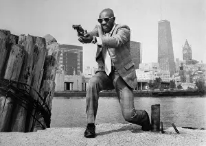 Isaac Hayes in Shooting Position in Movie Scene