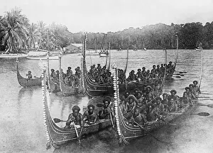 Islanders Rowing War Canoes