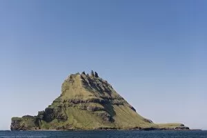 Images Dated 29th May 2013: Islet of Tindholmur or Tindholmur, rugged cliffs rising from the sea, Vagar, Faroe Islands, Denmark