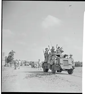 Israeli Tank Carrying Soldiers
