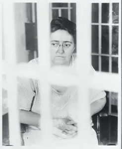 Lakehurst Prints: Ivy Giberson Sitting Behind Jail Cell Bars