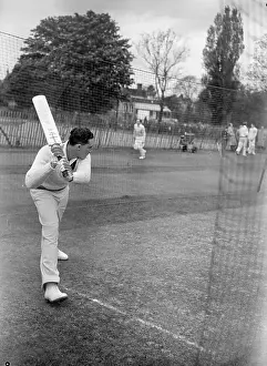 Prints of 10th June 1950: West Indian batsman Jeffrey B Stollmeyer practising in the nets before the match against Cambridge University A Photographic Legacy: J B Stollmeyer