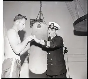 Teaching Prints: J. Dempsey Gives Commander Punching Tips
