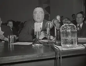 J. Edgar Hoover Speaking at Microphones