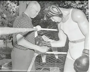 Jack Blackburn Helping Joe Louis with Gloves