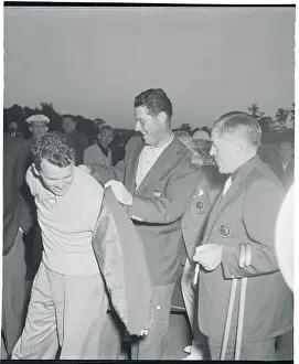 Jack Burke Putting on His Masters Coat