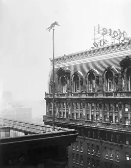 Stunt Prints: Jack Crippen Balancing Himself atop Flagpole