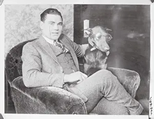 Monocle Prints: Jack Dempsey and Dog Both Wearing Eyewear