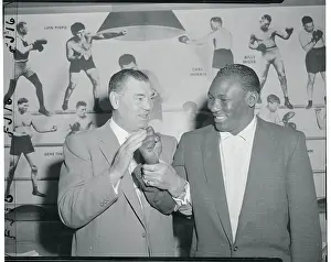 Jack Dempsey Holding Julio Mederos Hand