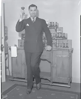 Jack Dempsey Raising Glass