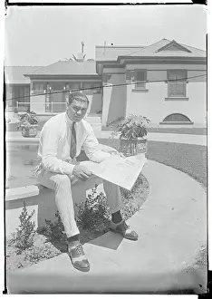 Jack Dempsey Reading the Paper