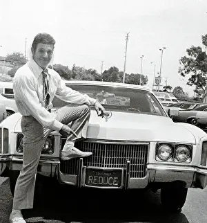 Jack LaLanne Posing with His Car