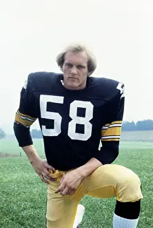 Jack Lambert Kneeling