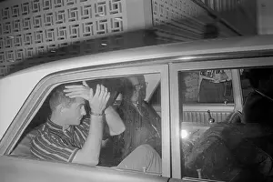 Jack Murphy and Allen Dale Kuhn Hiding from Cameras