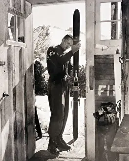 Skis Prints: Jack Redding Checking Out Skis in Doorway