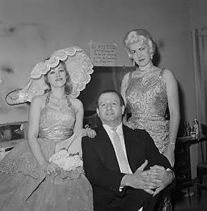 Jack Ruby Sitting with Women Standing Overhead