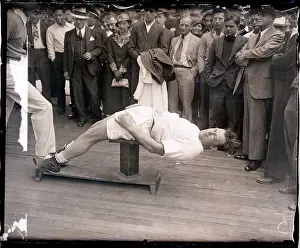Jack Sharkey Doing Sit-Ups on Post