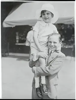 jackie-coogan-holding-brother-
