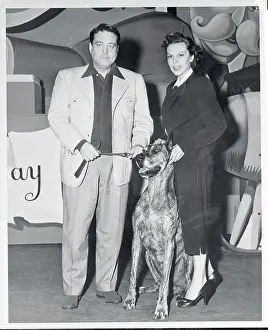 Jackie Gleason with Great Dane and Its Owner