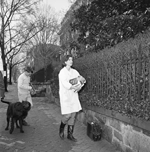 Jackie Kennedy Carrying Books
