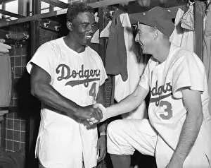 Jackie Robinson and Billy Cox Shaking Hands
