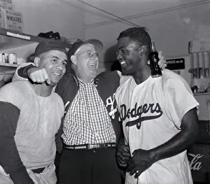Jackie Robinson with Burt Shotton and Roy Campanella