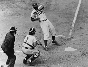 Jackie Robinson Examining Arm Hit by Ball