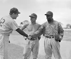 Jackie Robinson and Pee Wee Reese Greeting Ray Sanders