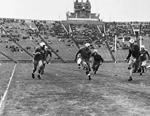 Jackie Robinson Running with Football
