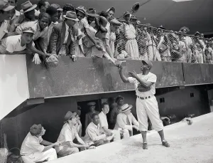 Adoration Prints: Jackie Robinson Signing Autographs from Field