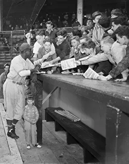Teenage Boy Prints: Jackie Robinson Signs Autographs