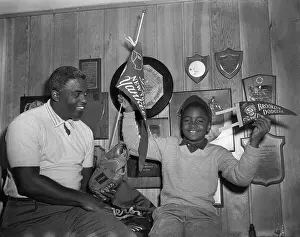 Jackie Robinson with His Son at Home