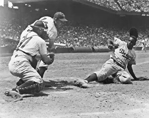 Jackie Robinson Steals and Slides Into Home