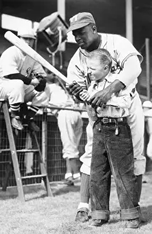 Anaheim Prints: Jackie Robinson Teaching a Young Boy How to Hold a Baseball Bat