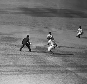 Jackie Robinson Trying to Steal Second Base
