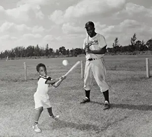 Jackie Robinson Watching His Son Jackie Jr Hitting Ball