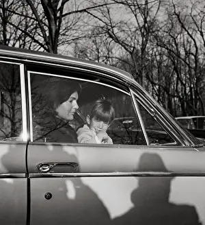 Jacqueline Bouvier Kennedy with John F. Kennedy Jr. in Limousine