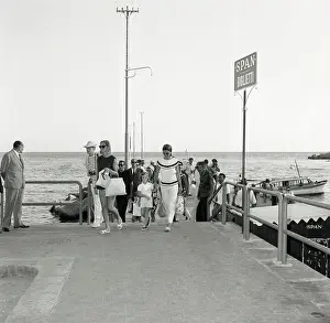 Jacqueline Bouvier Kennedy Onassis and Daughter Caroline Being Escorted Near Dock