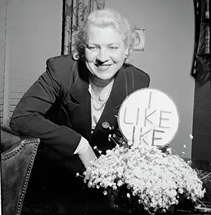 Riverside Prints: Jacqueline Cochran Standing with Flower Arrangement