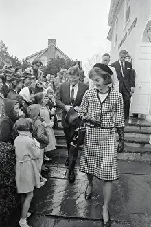 Jacqueline and John Kennedy Smiling to Youngsters