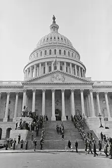 Jacqueline Kennedy and Children Climbing Capitol Steps