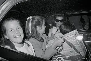 Jacqueline Kennedy Entering Automobile