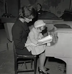 Jacqueline Kennedy Holding Daughter