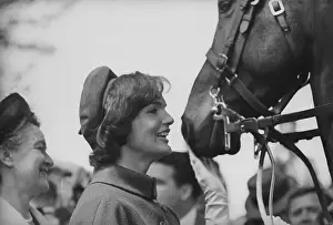 Jacqueline Kennedy Looking at a Horse