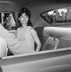 Jacqueline Kennedy Riding in a Car
